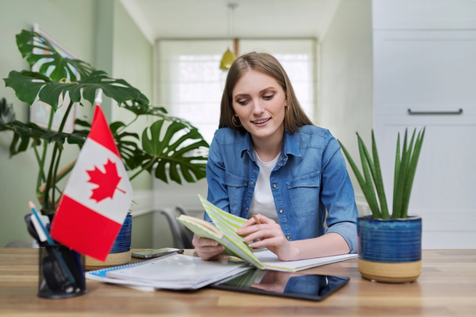 Client preparing Permanent Resident Card renewal application with Canadian flag